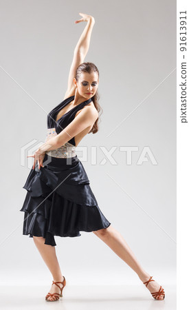studio portrait of young attractive woman dancing flamenco studio portrait of young attractive woman dancing flamenco 91613911