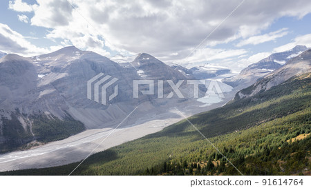 Beautiful pristine alpine valley surrounded by mountains and with glacier on its end, Jasper, Canada 91614764