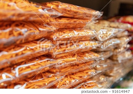 Fresh Snacks In Plastic Displayed At Shop Fresh Snacks In Plastic Displayed At Shop 91614947