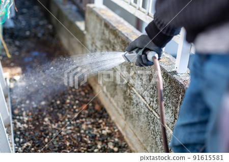 Man laying gravel Man laying gravel 91615581