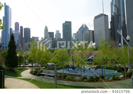 CHICAGO, ILLINOIS, UNITED STATES - 11 May 2018: Children's playground at Maggie Daley Park in downtown Chicago CHICAGO, ILLINOIS, UNITED STATES - 11 May 2018: Children's playground at Maggie Daley Park in downtown Chicago 91615798