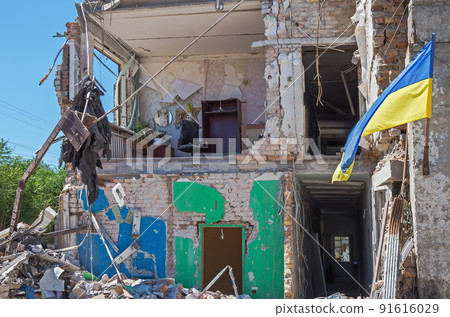 Destroyed brick office building after car service bombing Destroyed brick office building after car service bombing 91616029