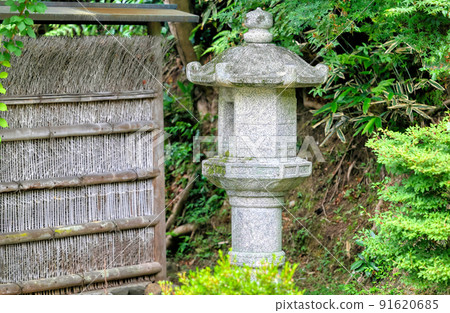 Stone lanterns at Konpukuji Temple in Ichijoji, Kyoto 91620685