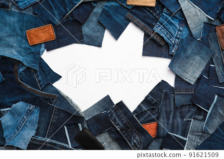 Frame made of cut jeans isolated on white. Space for text 91621509