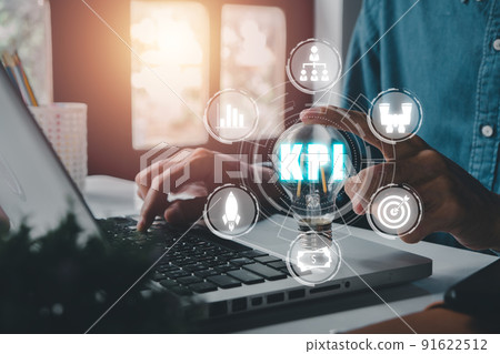 KPI Key performance indicator business internet technology concept, Businessman hand holding lamp with kpi icon on virtual screen, Measurement, Optimization, Strategy, Evaluation and check list. 91622512