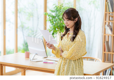Young woman taking classes remotely Young woman taking classes remotely 91624917