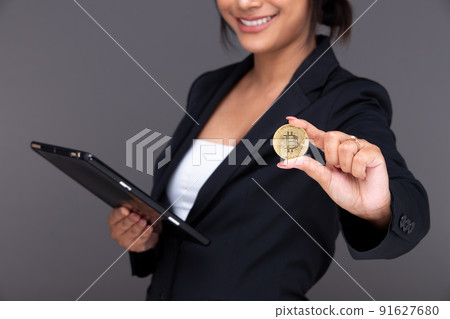 Asian Indian business woman show beautiful smile happy lips, show BTC bitcoin cryptocurrency Asian Indian business woman show beautiful smile happy lips, show BTC bitcoin cryptocurrency 91627680
