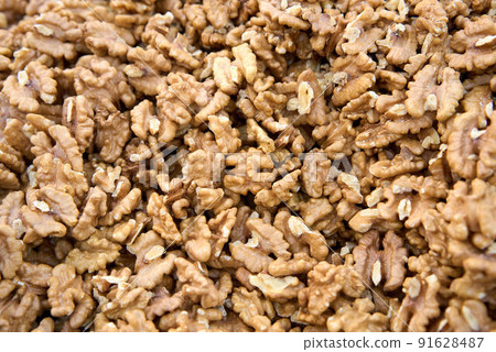 Closeup of big shelled walnuts pile Closeup of big shelled walnuts pile 91628487