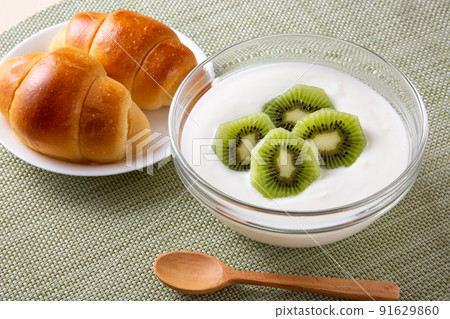Kiwi yogurt and bread Kiwi yogurt and bread 91629860