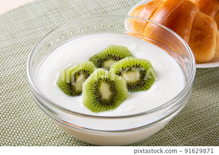 Kiwi yogurt and bread Kiwi yogurt and bread 91629871