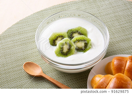 Kiwi yogurt and bread Kiwi yogurt and bread 91629875