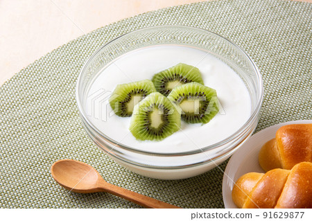 Kiwi yogurt and bread Kiwi yogurt and bread 91629877