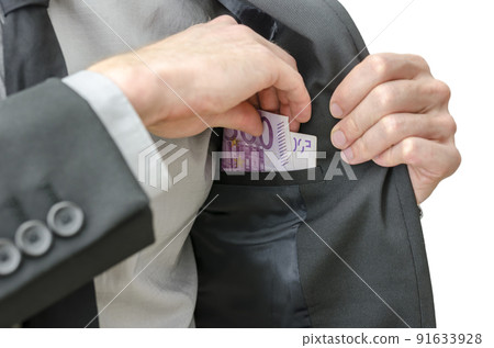 Putting banknotes in a jacket pocket 91633928