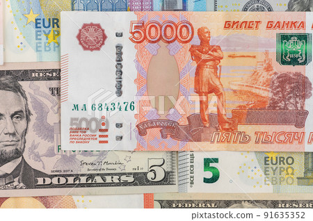 Money background from different countries: dollars, euros, rubles. International currencies. 5000 rubles 91635352