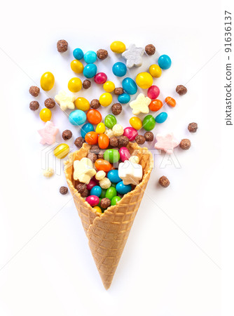 Ice cream waffle cone with candy isolated on white background 91636137