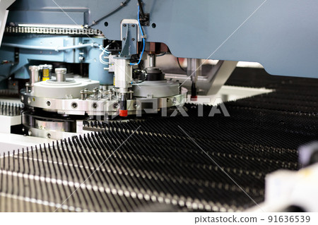 industrial CNC turret punching machine close up 91636539