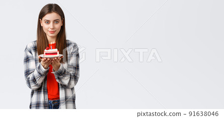 People lifestyle, holidays and celebration, emotions concept. Dreamy gorgeous young woman celebrate her birthday, holding b-day cake with lit candle, smiling kind at camera People lifestyle, holidays and celebration, emotions concept. Dreamy gorgeous young woman celebrate her birthday, holding b-day cake with lit candle, smiling kind at camera 91638046