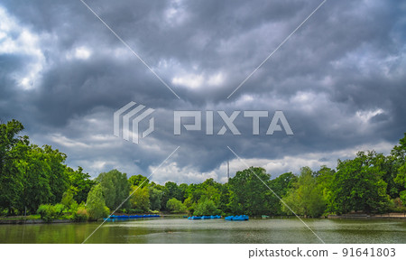 Empty blue paddle boats in London Park 91641803