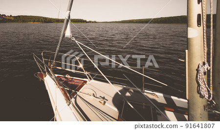 Boat on the shore of a lake in summer Boat on the shore of a lake in summer 91641807