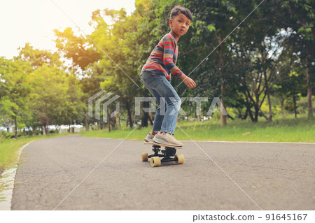 boy having fun skateboarding boy having fun skateboarding 91645167
