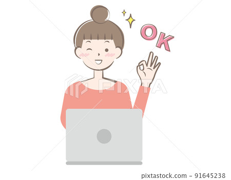 A woman who gives an OK sign by operating a computer A woman who gives an OK sign by operating a computer 91645238