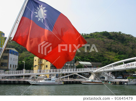 Taiwan flag fluttering on the stern (blue sky with a white sun, red flag) 91645479