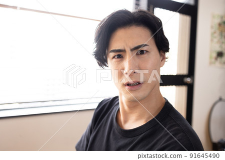 A man with a troubled face A man with a troubled face 91645490