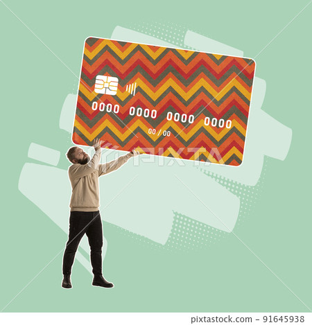 Contemporary art collage. Modern design with young man holding plastic credit card isolated on green background. 91645938