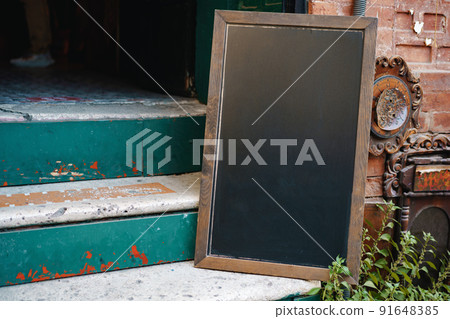 Cafe blank signboard on the street mock up 91648385