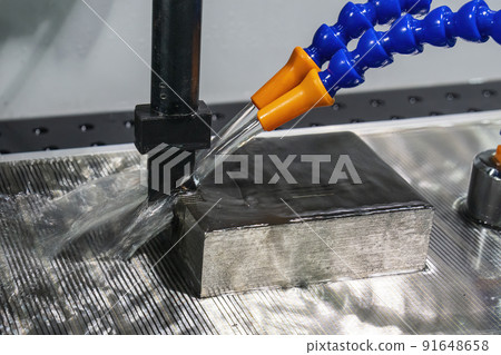 Close up scene of EDM processing by graphite electrode. Close up scene of EDM processing by graphite electrode. 91648658