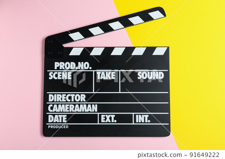 Clapper board on color background, top view. Cinema production Clapper board on color background, top view. Cinema production 91649222