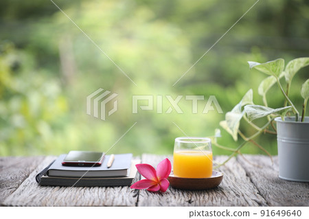 Mango juice and frangipani flower Mango juice and frangipani flower 91649640