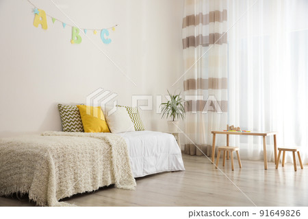 Modern child room interior with comfortable bed 91649826