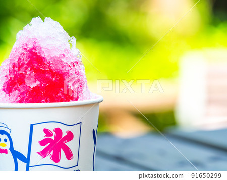Summer tradition, exceptionally delicious shaved ice when it's hot, strawberry flavor Summer tradition, exceptionally delicious shaved ice when it's hot, strawberry flavor 91650299