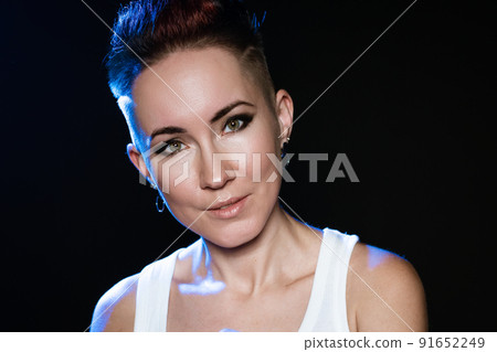 Beautiful middle-aged woman with short hair. Beautiful face cute sensual woman. 91652249