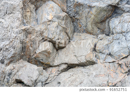 Geological rock layers.Close-up abstract shot of the rock face Geological rock layers.Close-up abstract shot of the rock face 91652751
