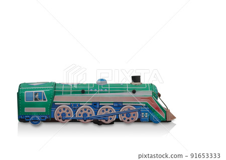 side view ancient green and blue zinc train toy on white background, object, vintage, retro, modern, copy space side view ancient green and blue zinc train toy on white background, object, vintage, retro, modern, copy space 91653333