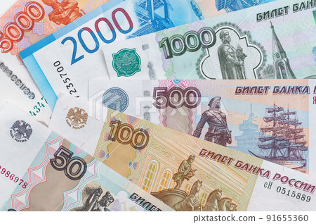 Russian rubles background. Money background and texture. Banknotes of different denominations 91655360