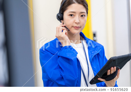 Young woman with wireless income Young woman with wireless income 91655620