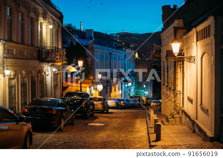 Night View Of City Streets Of Tbilisi. Parked Cars In A Row On A Street Of Tbilisi 91656019