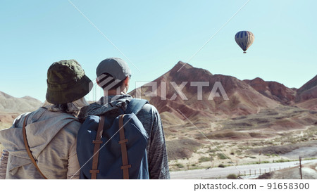 rear view of an asian couple tourists looking at view in national geological park 91658300
