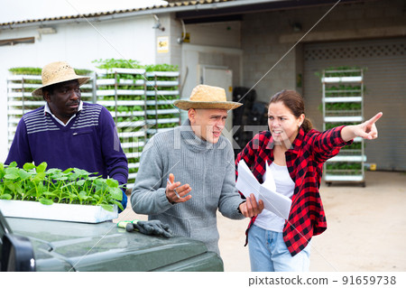 Conflict of farmer and a hired worker in backyard 91659738