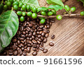 Fresh coffee beans on canvas texture background 91661596