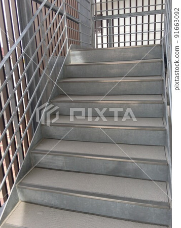 A view of the iron emergency stairs that are common in buildings 91663092