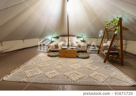 Tent interior at glamping, night 91671720