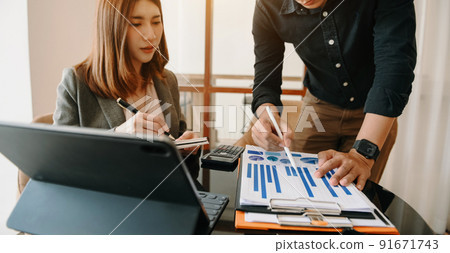 Business team meeting present.professional investor working with Finance managers task. with digital tablet,smartphone and laptop 91671743