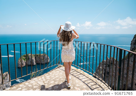 Woman at a view point in Capri, Italy 91671765