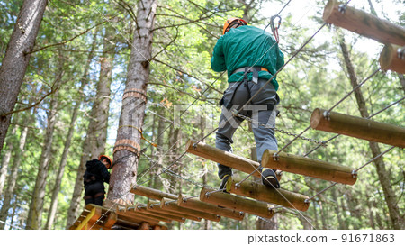 Climbing adventure park in the Carpathians in Romania 91671863