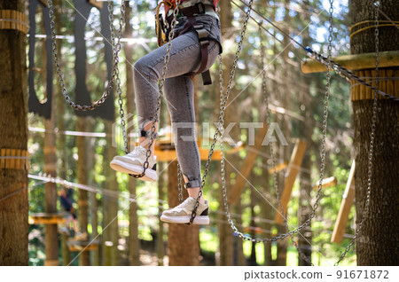 Climbing adventure park in the Carpathians in Romania 91671872