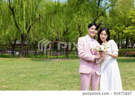 Korean Asian couple self small wedding concept in spring 91675887